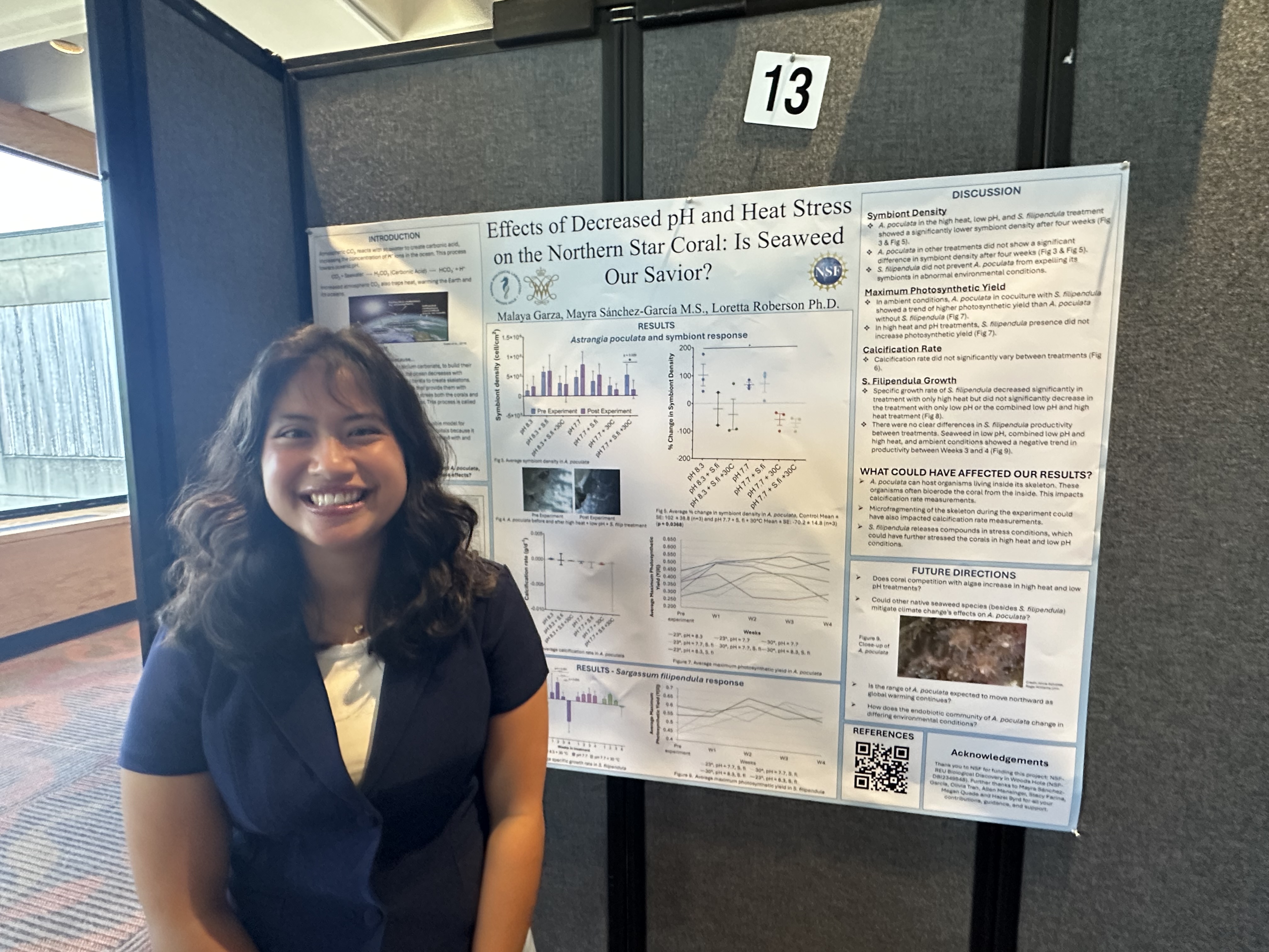 Malaya presenting her research poster