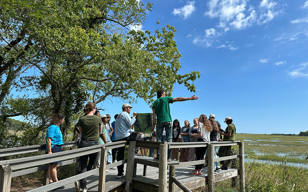 Batten School Professor Chris Hein leads a discussion at the Eastern Shore of Virginia National Wildlife Refuge.