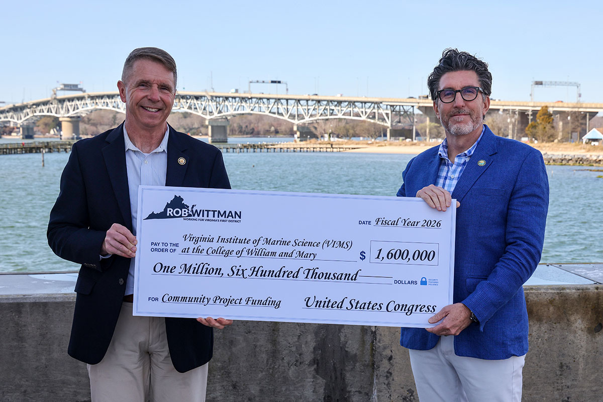 U.S. Rep. Rob Wittman presents Batten School &amp; VIMS Dean and Director Derek Aday with a ceremonial check representing federal funds appropriated in support of CEEF. Photo by John Wallace. 